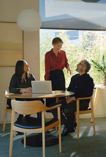 Desktop wealth management interface with scroll-to-reveal feature